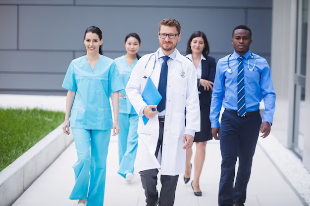 Doctors and nurses walking to another hospital wing